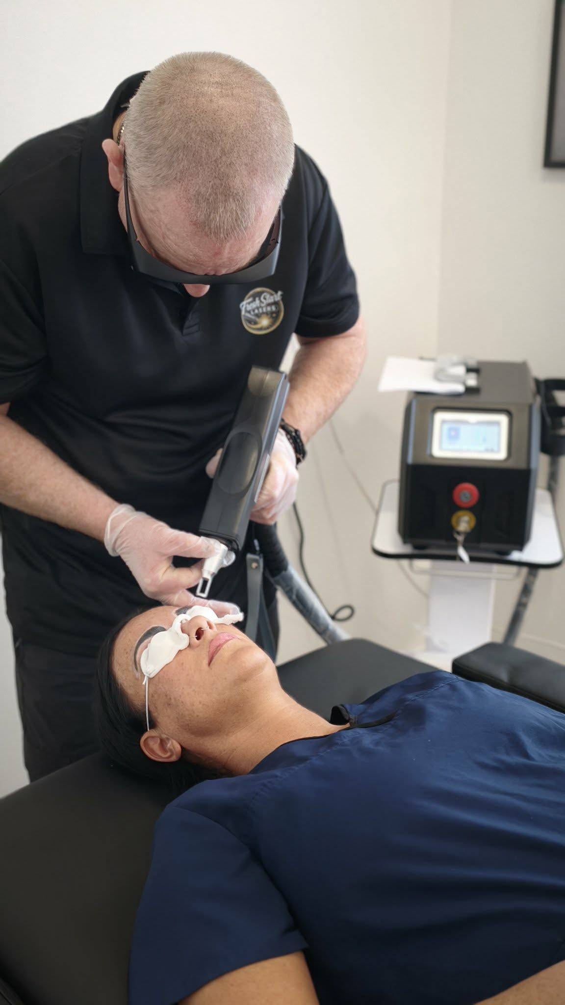 Close-up of eyebrow area during cosmetic tattoo removal treatment